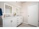 Bright bathroom featuring a double vanity with marble countertop and modern fixtures at 6206 E Avalon Dr, Scottsdale, AZ 85251