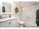 Clean bathroom featuring a marble vanity, a glass-enclosed shower and modern fixtures at 6206 E Avalon Dr, Scottsdale, AZ 85251