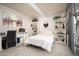 Cozy bedroom featuring a comfortable bed, lots of shelves, and a stylish workspace at 6206 E Avalon Dr, Scottsdale, AZ 85251