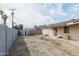 A spacious backyard with a shed and block fence offers ample room for outdoor activities at 6445 W Windsor Blvd, Glendale, AZ 85301