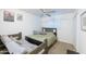Shared bedroom displaying a ceiling fan, window, and two beds with carpeted floors at 6445 W Windsor Blvd, Glendale, AZ 85301