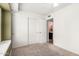 Bright bedroom features a ceiling fan and ample closet space at 6908 W Sunnyside Dr, Peoria, AZ 85345