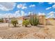 Single-story home features solar panels and low-maintenance desert landscaping with cacti and gravel at 6908 W Sunnyside Dr, Peoria, AZ 85345