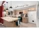 Kitchen featuring wood cabinets, track lighting, and black appliances offers great cooking potential at 6908 W Sunnyside Dr, Peoria, AZ 85345