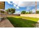 Spacious backyard with healthy lawn and block wall fencing at 7125 N 23Rd Ave, Phoenix, AZ 85021