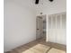 Bedroom featuring closet, neutral walls and wood-look flooring at 7125 N 23Rd Ave, Phoenix, AZ 85021