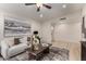 Comfortable living room featuring light wood floors, neutral color palette, and stylish decor at 7125 N 23Rd Ave, Phoenix, AZ 85021