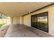 Large covered patio with sliding glass doors, perfect for outdoor living at 7125 N 23Rd Ave, Phoenix, AZ 85021