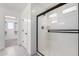 Bathroom featuring tile floors, a glass door shower, and a doorway to a walk in closet at 7342 S Debra Dr, Gilbert, AZ 85298