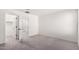 Bedroom featuring carpeted floors, white walls, and a doorway to a walk in closet at 7342 S Debra Dr, Gilbert, AZ 85298