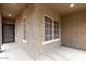 Inviting entryway featuring decorative door, neutral paint, and dark trim on the exterior at 7342 S Debra Dr, Gilbert, AZ 85298