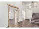 Bright foyer with wood-look floors, staircase, and clerestory windows for plenty of natural light at 7342 S Debra Dr, Gilbert, AZ 85298