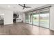 Open living space with sliding glass doors leading to a covered patio and backyard at 7342 S Debra Dr, Gilbert, AZ 85298