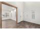 Open-concept living room boasts wood-look floors and bright, neutral paint throughout at 7342 S Debra Dr, Gilbert, AZ 85298
