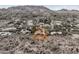 An aerial view of a desert home with a red tile roof and mountain views at 8031 N 54Th St, Paradise Valley, AZ 85253