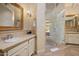 Elegant bathroom with dual vanities, granite countertops, and a glass-enclosed shower, providing a spa-like experience at 8031 N 54Th St, Paradise Valley, AZ 85253
