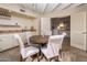 Charming breakfast nook featuring ample seating, bright lighting, and access to laundry room, perfect for casual meals at 8031 N 54Th St, Paradise Valley, AZ 85253