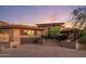 Beautiful brick home with arched windows, tile roof, and three-car garage at 8031 N 54Th St, Paradise Valley, AZ 85253