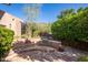Inviting outdoor kitchen with a built-in grill and tiled countertops, perfect for al fresco dining and entertaining guests at 8031 N 54Th St, Paradise Valley, AZ 85253
