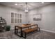 Cozy dining room featuring modern table, benches, and decorative lighting, creating an inviting atmosphere at 8544 W Mary Ann Dr, Peoria, AZ 85382