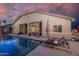 Sparkling pool with lounge chairs and lush landscaping, perfect for outdoor living at 8544 W Mary Ann Dr, Peoria, AZ 85382