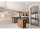 Spacious kitchen with stainless steel appliances and kitchen island at 8614 W Shaw Butte Dr, Peoria, AZ 85345