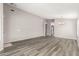 Spacious, open-concept living room with hardwood floors and natural light at 8614 W Shaw Butte Dr, Peoria, AZ 85345