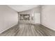 Spacious living room with modern wood-look floors and neutral paint at 8614 W Shaw Butte Dr, Peoria, AZ 85345