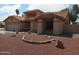 Charming home featuring a tile roof, desert landscaping, and inviting curb appeal at 9203 W Behrend Dr, Peoria, AZ 85382