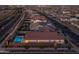 Features aerial view of a house with a backyard pool and surrounding neighborhood at 9612 E Rainbow Ave, Mesa, AZ 85212
