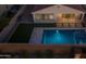 Aerial view showcases the backyard pool, landscaping, and outdoor living space at 9612 E Rainbow Ave, Mesa, AZ 85212