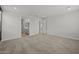 Large main bedroom boasts carpet flooring and easy access to ensuite bath and closet at 9612 E Rainbow Ave, Mesa, AZ 85212