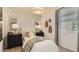 Charming bedroom with patterned wallpaper, stylish furnishings, and ample natural light at 9627 W Cheery Lynn Rd, Phoenix, AZ 85037