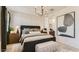 Serene main bedroom with elegant decor, natural light, and a relaxing ambiance at 9627 W Cheery Lynn Rd, Phoenix, AZ 85037