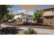 Community playground featuring a climbing structure and benches surrounded by trees and homes at 9627 W Cheery Lynn Rd, Phoenix, AZ 85037