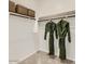 Well-organized walk-in closet with shelving and ample storage at 9627 W Cheery Lynn Rd, Phoenix, AZ 85037