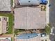This aerial provides an overview of the property's roof, yard, and nearby neighborhood streets, enhancing the property's value at 9853 E Solstice Ave, Mesa, AZ 85212