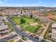 Aerial view of a community park with playground and sports fields surrounded by lovely homes at 9853 E Solstice Ave, Mesa, AZ 85212
