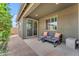 Spacious covered patio with comfortable seating, perfect for outdoor entertaining at 9853 E Solstice Ave, Mesa, AZ 85212