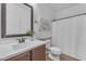 Charming bathroom featuring tile floors, vanity, and tub with shower at 9853 E Solstice Ave, Mesa, AZ 85212