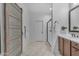 Well-appointed bathroom with marble floors, a modern vanity, and glass-enclosed shower for a spa-like experience at 9853 E Solstice Ave, Mesa, AZ 85212