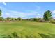 Expansive community green space perfect for recreation and relaxation at 9853 E Solstice Ave, Mesa, AZ 85212