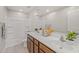 Bathroom features dual sinks, tile floors, and a shower-tub combo for convenience at 9911 E Telemetry Dr, Mesa, AZ 85212