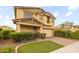 Charming two-story home featuring a two-car garage, well-maintained landscaping, and a welcoming entrance at 9911 E Telemetry Dr, Mesa, AZ 85212