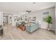 Open living area with stylish seating, tile flooring, and plenty of natural light at 9911 E Telemetry Dr, Mesa, AZ 85212