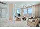 Cozy upstairs loft area with comfortable seating, neutral tones, and lots of natural light at 10049 E Ulysses Ave, Mesa, AZ 85212