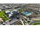 Aerial view showcases the community pool with a splash pad and lounge area at 10156 E Talon Ave, Mesa, AZ 85212