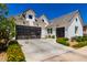 Lovely new construction home with a two-car garage surrounded by vibrant landscaping at 10156 E Talon Ave, Mesa, AZ 85212