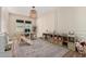 Bright playroom with climbing toy, shelving, and decorative rug for children at 10156 E Talon Ave, Mesa, AZ 85212