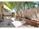 Charming backyard with mature tree, garden bed and private fence at 10235 N 31St St # 15, Phoenix, AZ 85028